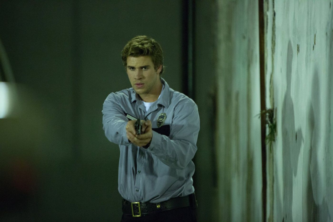 Liam Hemsworth stars as Chris in Lionsgate's Empire State (2013)