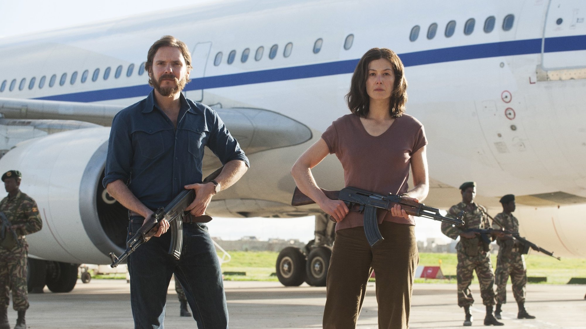 Daniel Bruhl stars as Wilfried Bose and Rosamund Pike stars as Brigitte Kuhlmann in Focus Features' 7 Days in Entebbe (2018)
