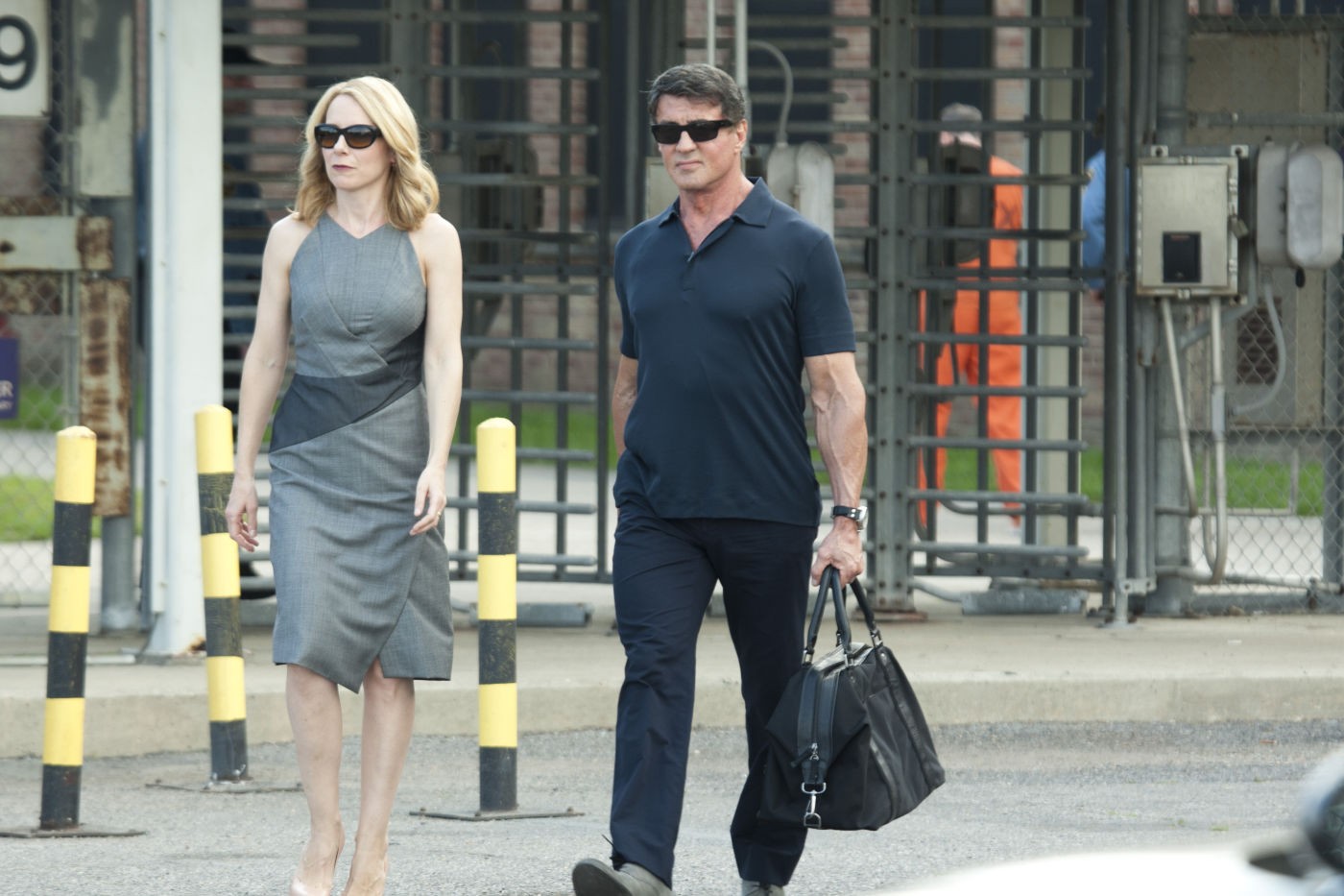 Amy Ryan stars as Abigail and Sylvester Stallone stars as Ray Breslin in Summit Entertainment's Escape Plan (2013)