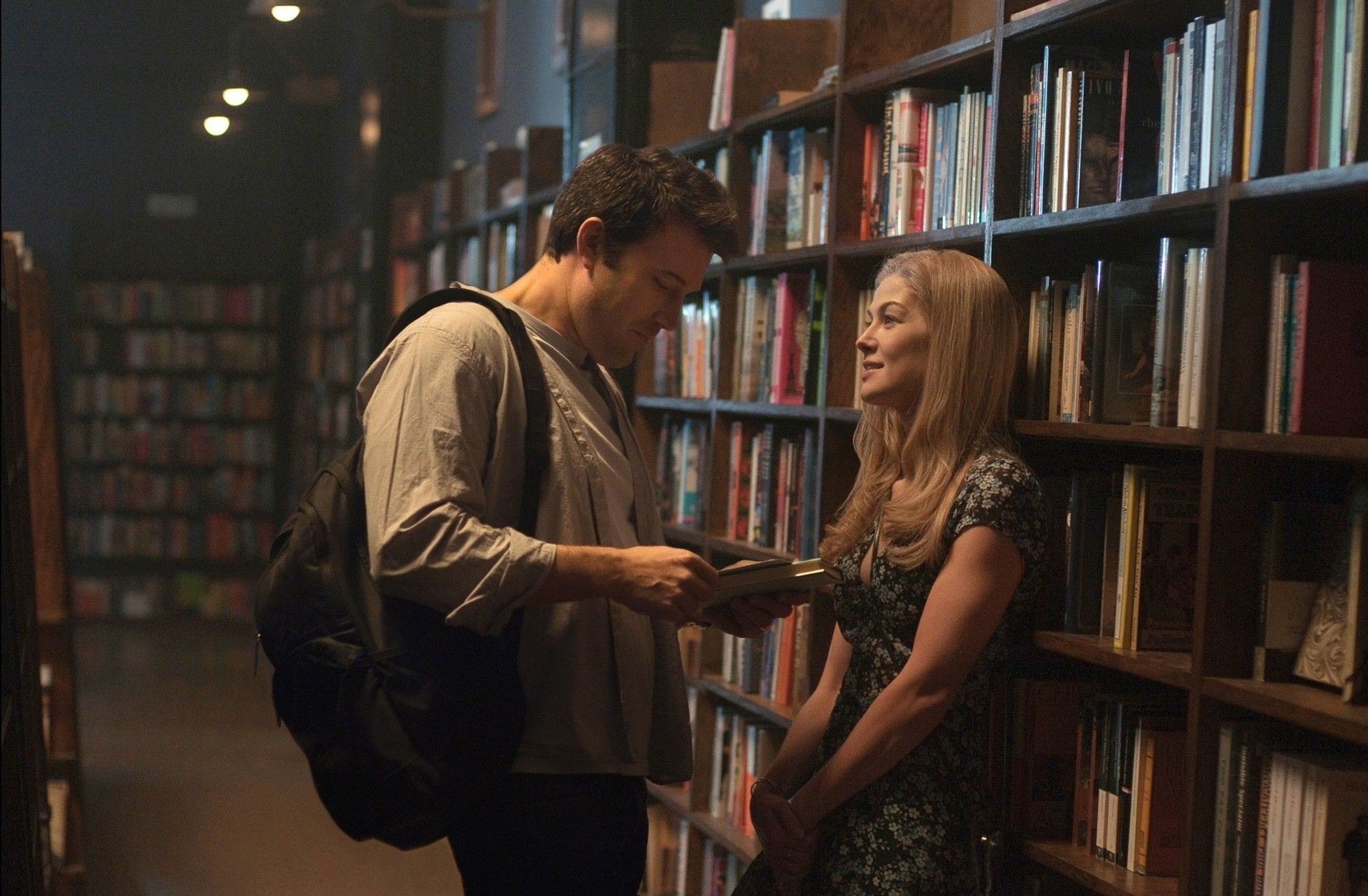 Ben Affleck stars as Nick Dunne and Rosamund Pike stars as Amy Dunne in 20th Century Fox's Gone Girl (2014)
