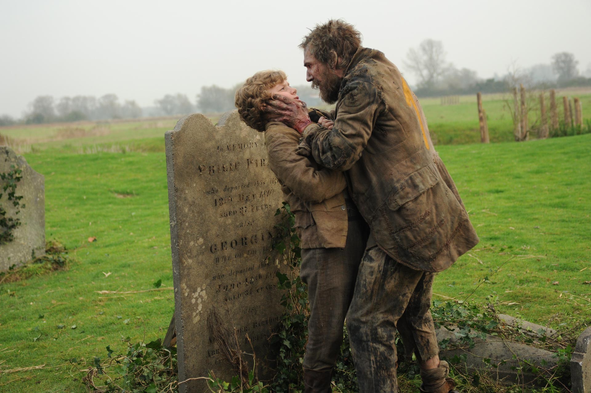 Toby Irvine stars as Young Pip and Jason Flemyng stars as Joe Gargery in Main Street Films' Great Expectations (2013)