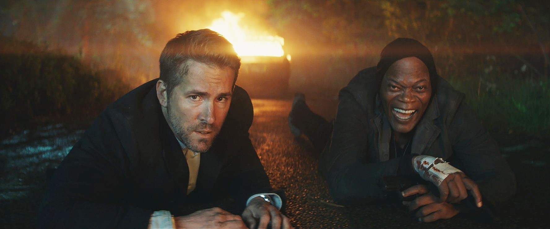 Ryan Reynolds and Samuel L. Jackson in Lionsgate Films' The Hitman's Bodyguard (2017)