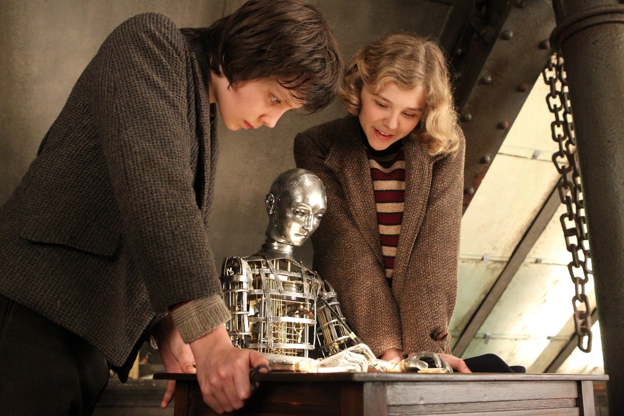 Asa Butterfield stars as Hugo Cabret snd Chloe Moretz stars as Isabelle in Paramount Pictures' Hugo (2011)