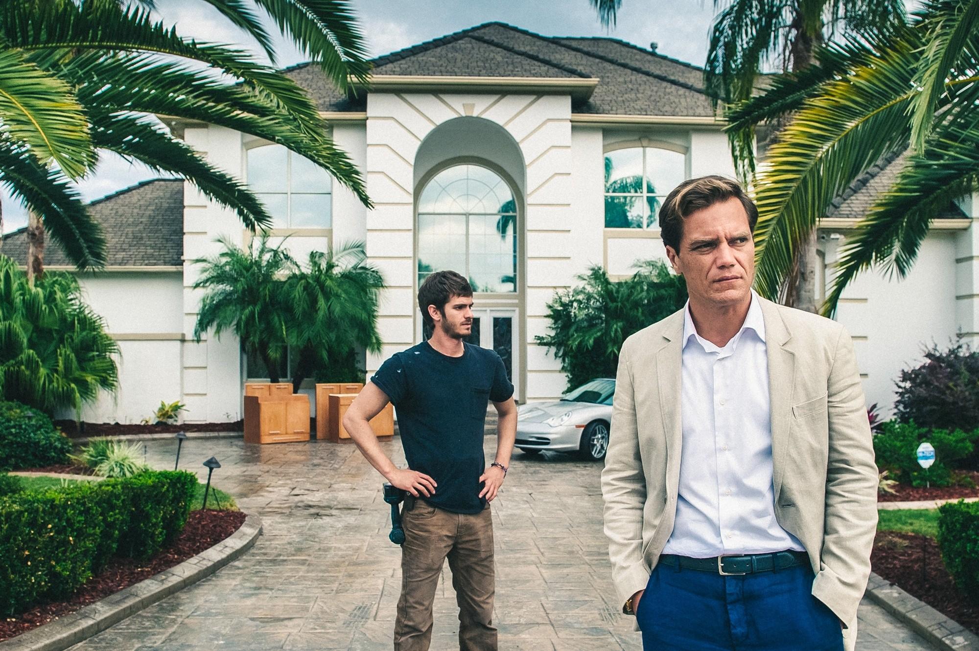 Andrew Garfield stars as Dennis Nash and Michael Shannon stars as Rick Carver in Broad Green Pictures' 99 Homes (2015)