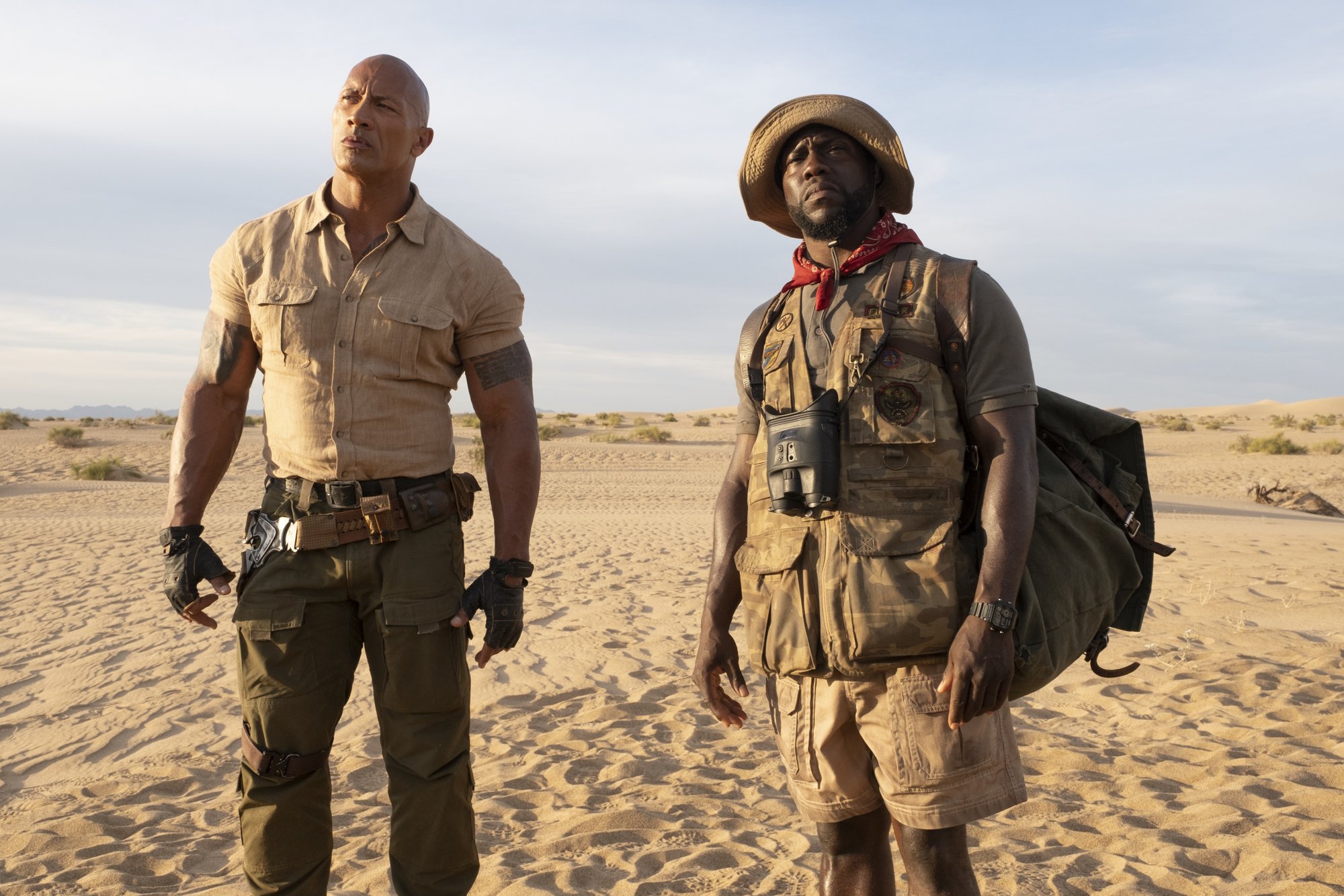 The Rock stars as Eddie and Kevin Hart stars as Mouse Finbar/Fridge in Sony Pictures' Jumanji: The Next Level (2019)