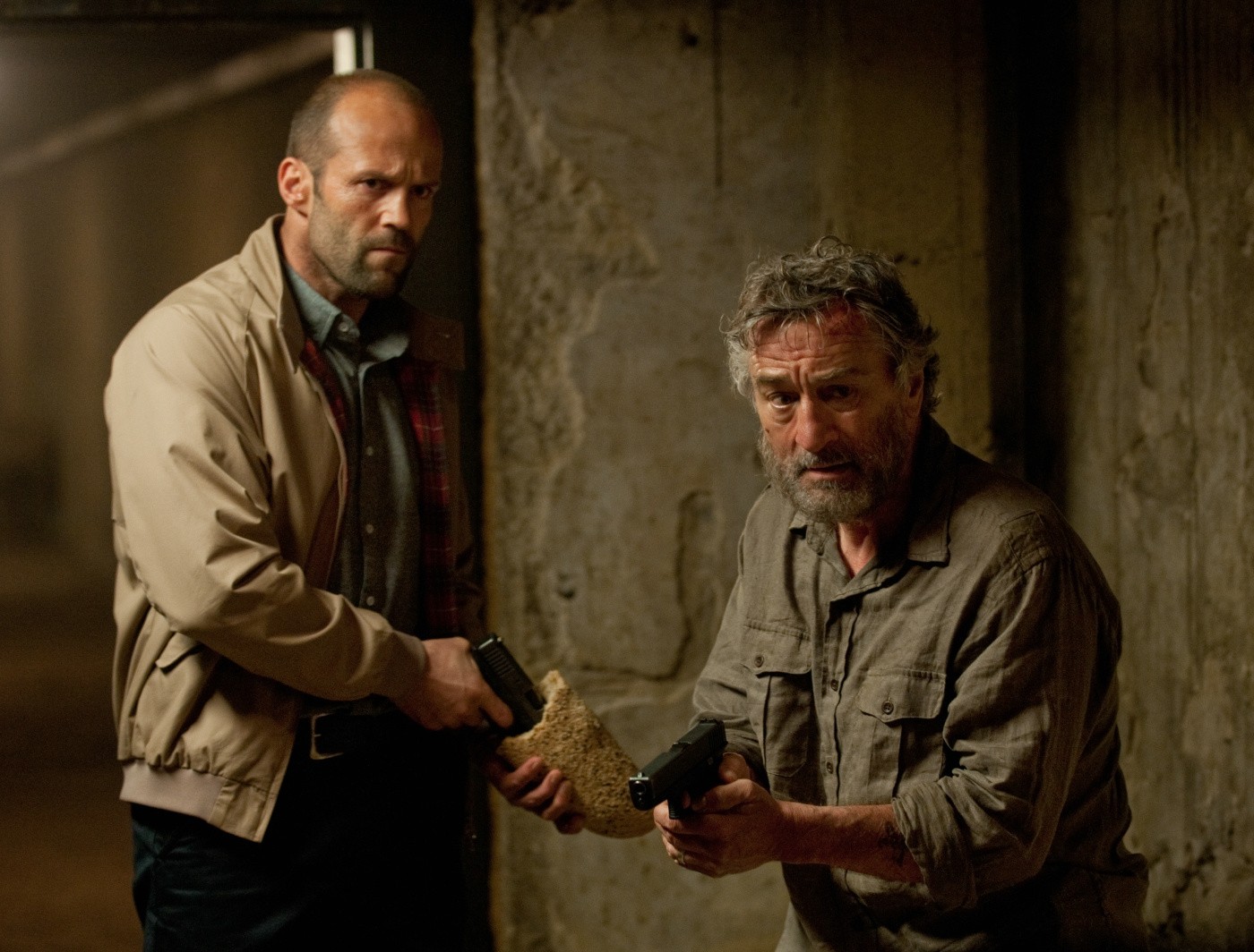 Jason Statham stars as Danny Bryce and Robert De Niro stars as Hunter in Open Road Films' Killer Elite (2011)