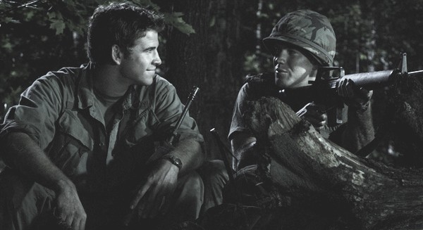 Liam Hemsworth stars as Mickey Wright and Austin Stowell stars as Dalton Joiner in IFC Films' Love and Honor (2013)