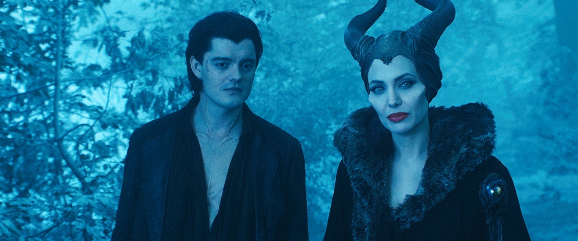 Sam Riley stars as Diaval and Angelina Jolie stars as Maleficent in Walt Disney Pictures' Maleficent (2014)