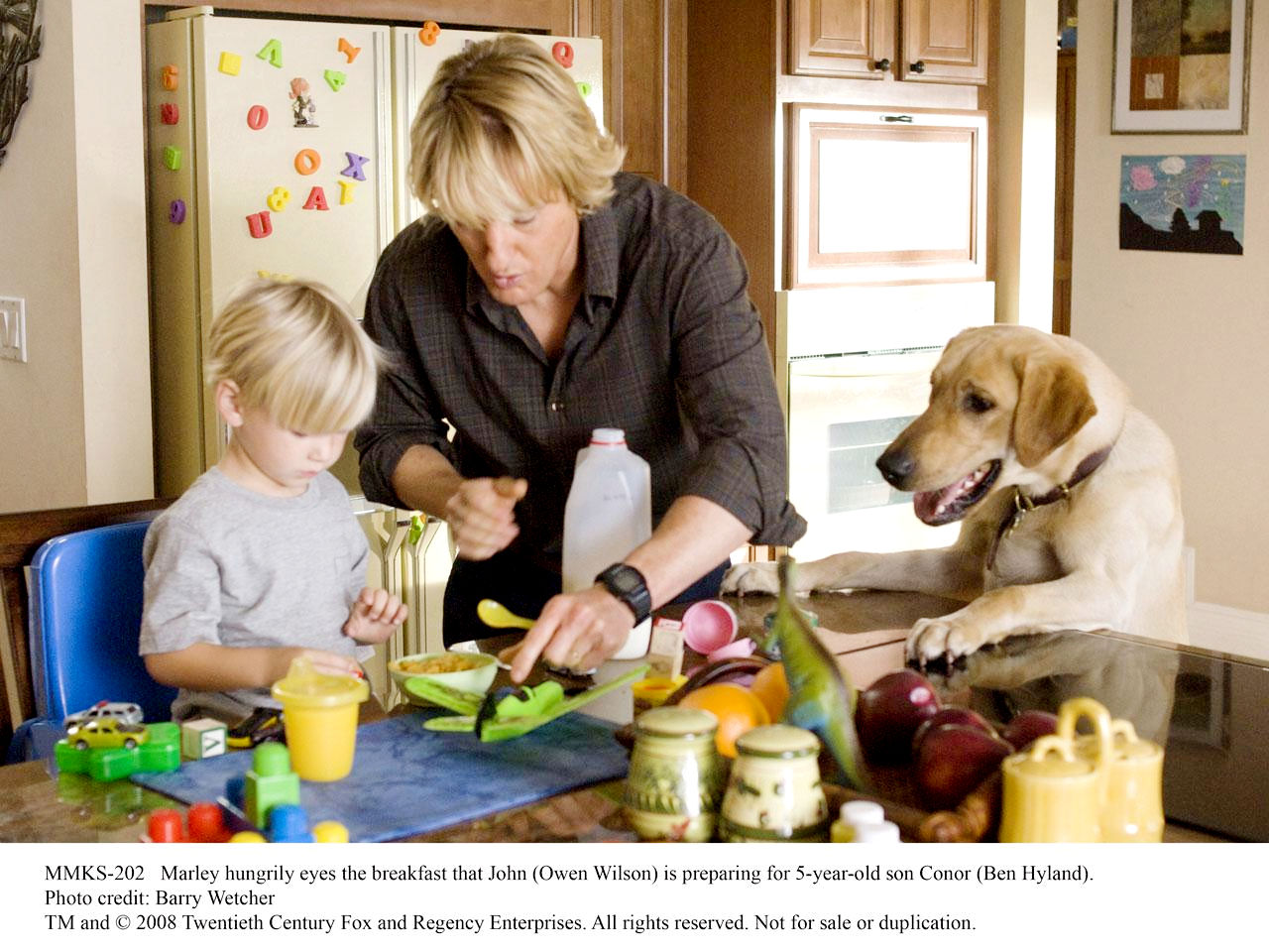 Benjamin Hyland stars as Conor and Owen Wilson stars as John Grogan in Fox 2000 Pictures' Marley & Me (2008). Photo credit by Barry Wetcher.