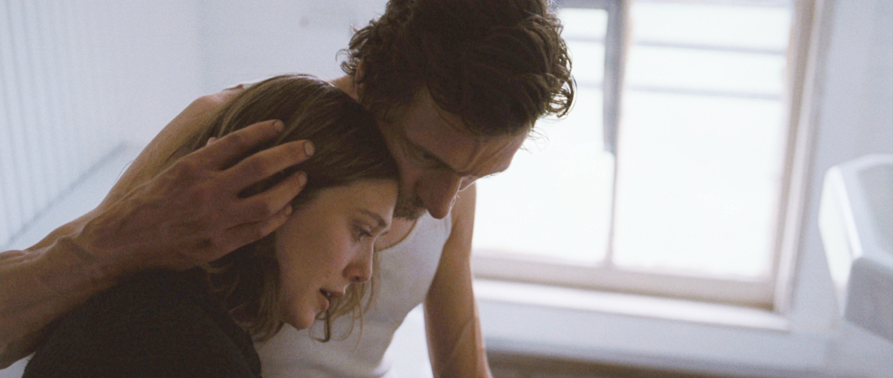 Elizabeth Olsen stars as Martha and John Hawkes stars as Patrick in Fox Searchlight Pictures' Martha Marcy May Marlene (2011)