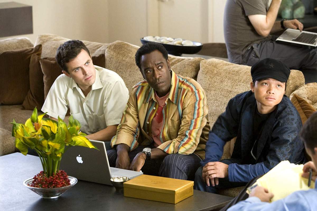 Casey Affleck, Don Cheadle and Shaobo Qin in Warner Bros' Ocean's Thirteen (2007)