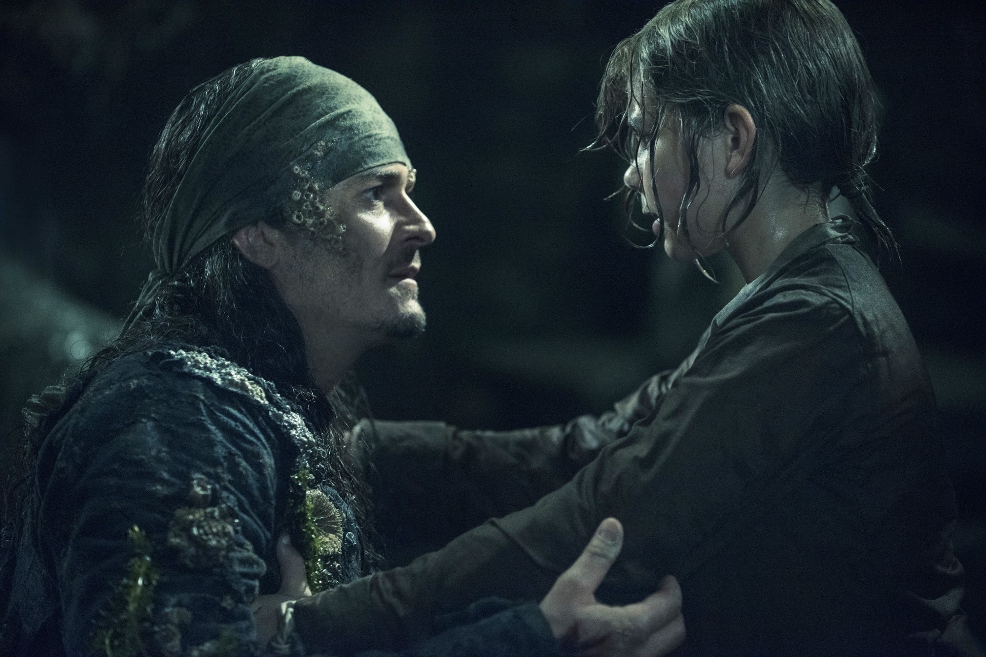 Orlando Bloom stars as Will Turner and Lewis McGowan stars as Henry Turner in Walt Disney Pictures' Pirates of the Caribbean: Dead Men Tell No Tales (2017)