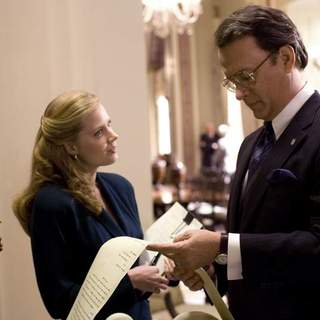 Amy Adams as Bonnie and Tom Hanks as Charlie Wilson in Universal Pictures' Charlie Wilson's War (2007)