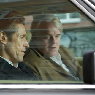 Willem Dafoe stars as Tommy Brue and Philip Seymour Hoffman stars as Gunther Bachmann in Roadside Attractions' A Most Wanted Man (2014)