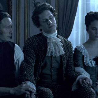 Mads Mikkelsen stars as Johann Friedrich Struensee and Alicia Vikander stars as Caroline Mathilde in Magnolia Pictures' A Royal Affair (2012)