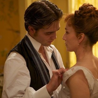 Robert Pattinson stars as Georges Duroy and Kristin Scott Thomas stars as Virginie Walters in Magnolia Pictures' Bel Ami (2012)