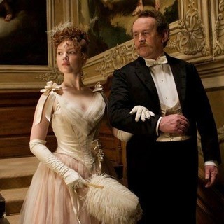 Holliday Grainger stars as Suzanne Rousset and Colm Meaney stars as Rousset in Magnolia Pictures' Bel Ami (2012)