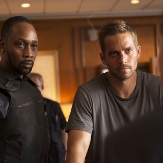 RZA stars as Tremaine and Paul Walker stars as Damien in Relativity Media's Brick Mansions (2014)