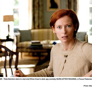Tilda Swinton stars as Katie Cox in Focus Features' Burn After Reading (2008). Photo credit by Macall Polay.