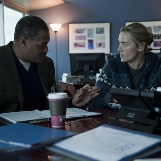 Laurence Fishburne stars as Dr. Ellis Cheever and Kate Winslet stars as Dr. Erin Mears in Warner Bros. Pictures' Contagion (2011)