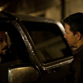 Giovanni Ribisi stars as Tim Briggs and Mark Wahlberg stars as Chris Farraday in Universal Pictures' Contraband (2012)