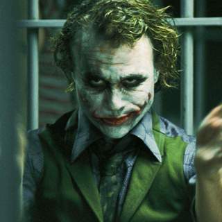 HEATH LEDGER stars as Joker in Warner Bros. Pictures' and Legendary Pictures' action drama 