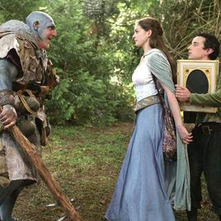Jim Carter (Ogre), Anne Hathaway and Aidan McArdle in Miramax Films' Ella Enchanted (2004)