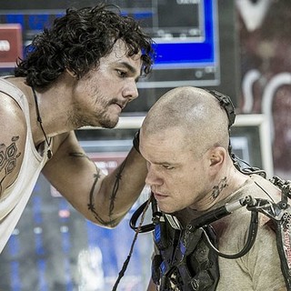 Wagner Moura and Matt Damon (stars as Max) in TriStar Pictures' Elysium (2013)