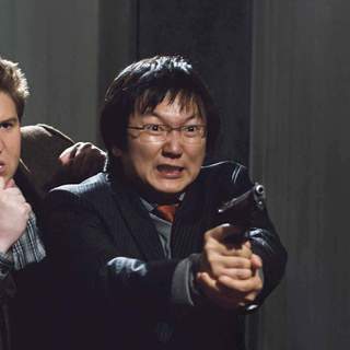 Nate Torrence stars as Lloyd and Masi Oka stars as Bruce in Warner Bros Pictures' Get Smart (2008). Photo by Tracy Bennett.
