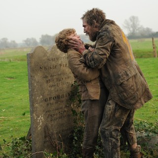 Toby Irvine stars as Young Pip and Jason Flemyng stars as Joe Gargery in Main Street Films' Great Expectations (2013)
