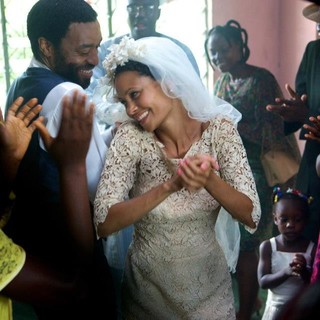 Chiwetel Ejiofor stars as Odenigbo and Thandie Newton stars as Olanna in Monterey Media's Half of a Yellow Sun (2014)