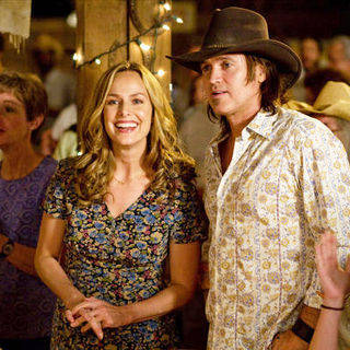 Melora Hardin and Billy Ray Cyrus (Robby Stewart) in Walt Disney Pictures' Hannah Montana: The Movie (2009). Photo credit by Sam Emerson.