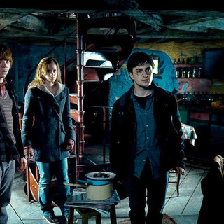 Rupert Grint, Emma Watson and Daniel Radcliffe in Warner Bros. Pictures' Harry Potter and the Deathly Hallows: Part I (2010)