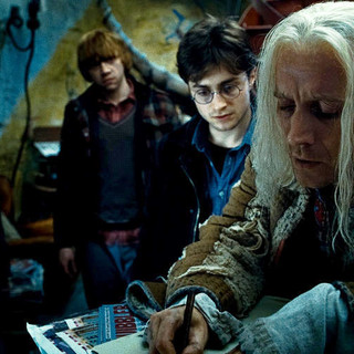 Emma Watson, Rupert Grint and Daniel Radcliffe in Warner Bros. Pictures' Harry Potter and the Deathly Hallows: Part I (2010)