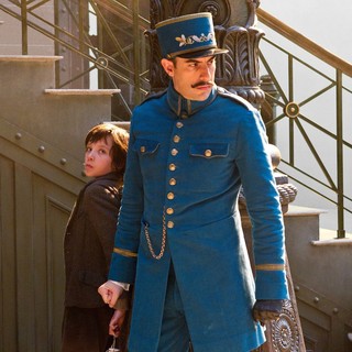 Asa Butterfield stars as Hugo Cabret and Sacha Baron Cohen stars as Station Inspector in Paramount Pictures' Hugo (2011)