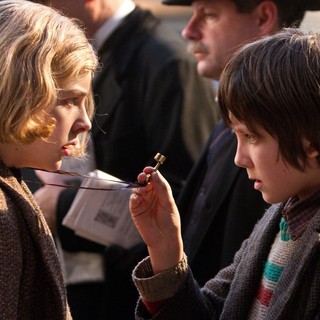 Chloe Moretz stars as Isabelle and Asa Butterfield stars as Hugo Cabret in Paramount Pictures' Hugo (2011)