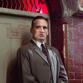Christopher Eccleston stars as Nipper Read in Universal Pictures' Legend (2015)