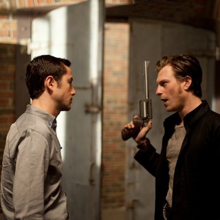 Joseph Gordon-Levitt stars as Joe and Noah Segan stars as Kid Blue in TriStar Pictures' Looper (2012)