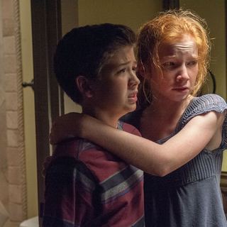 Garrett Ryan stars as Young Tim Russell and Annalise Basso stars as Young Kaylie Russell in Relativity Media's Oculus (2014)