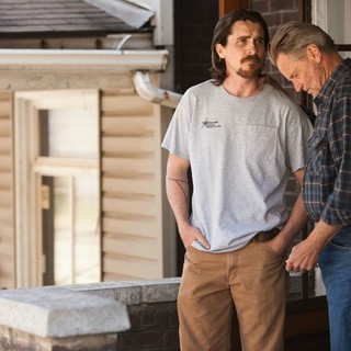 Christian Bale stars as Russell Baze and Sam Shepard stars as Red in Relativity Media's Out of the Furnace (2013)