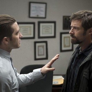 Jake Gyllenhaal stars as Detective Loki and Hugh Jackman stars as Keller Dover in Warner Bros. Pictures' Prisoners (2013)