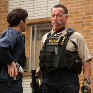 Olivia Williams stars as Investigator Caroline Brentwood and Arnold Schwarzenegger stars as John 'Breacher' Wharton in Open Road Films' Sabotage (2014)