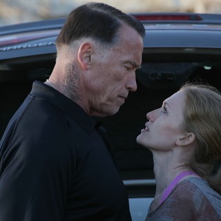 Arnold Schwarzenegger stars as John 'Breacher' Wharton and Mireille Enos stars as Lizzy in Open Road Films' Sabotage (2014)