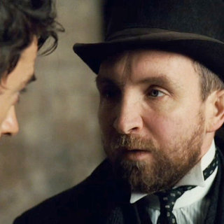 Robert Downey Jr. stars as Sherlock Holmes and Eddie Marsan stars as Inspector Lestrade in Warner Bros. Pictures' Sherlock Holmes (2009)