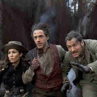 Noomi Rapace, Robert Downey Jr. and Jude Law in Warner Bros. Pictures' Sherlock Holmes: A Game of Shadows (2011)