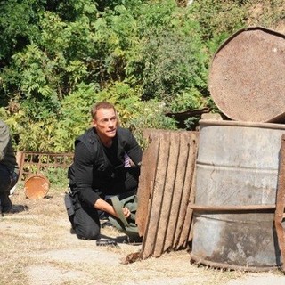 Joe Flanigan stars as Andrew Fayden and 	Jean-Claude Van Damme stars as Samson Gaul in Motion Picture Corporation of America's Six Bullets (2013)