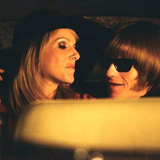 Leo Gregory as Brian Jones and Monet Mazur as Anita Pallenberg in Stoned (2006)