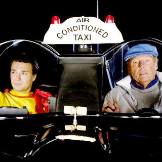 Justin Whalin stars as Ed Gruberman and Adam West stars as Cab Driver in Roadside Attractions' Super Capers (2009)