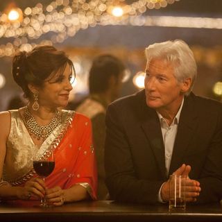Lillete Dubey stars as Mrs. Kapoor and Richard Gere stars as Guy in Fox Searchlight Pictures' The Second Best Exotic Marigold Hotel (2015). Photo credit by Laurie Sparham.