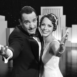 Jean Dujardin stars as George Valentin and Berenice Bejo stars as Peppy Miller in The Weinstein Company's The Artist (2011)